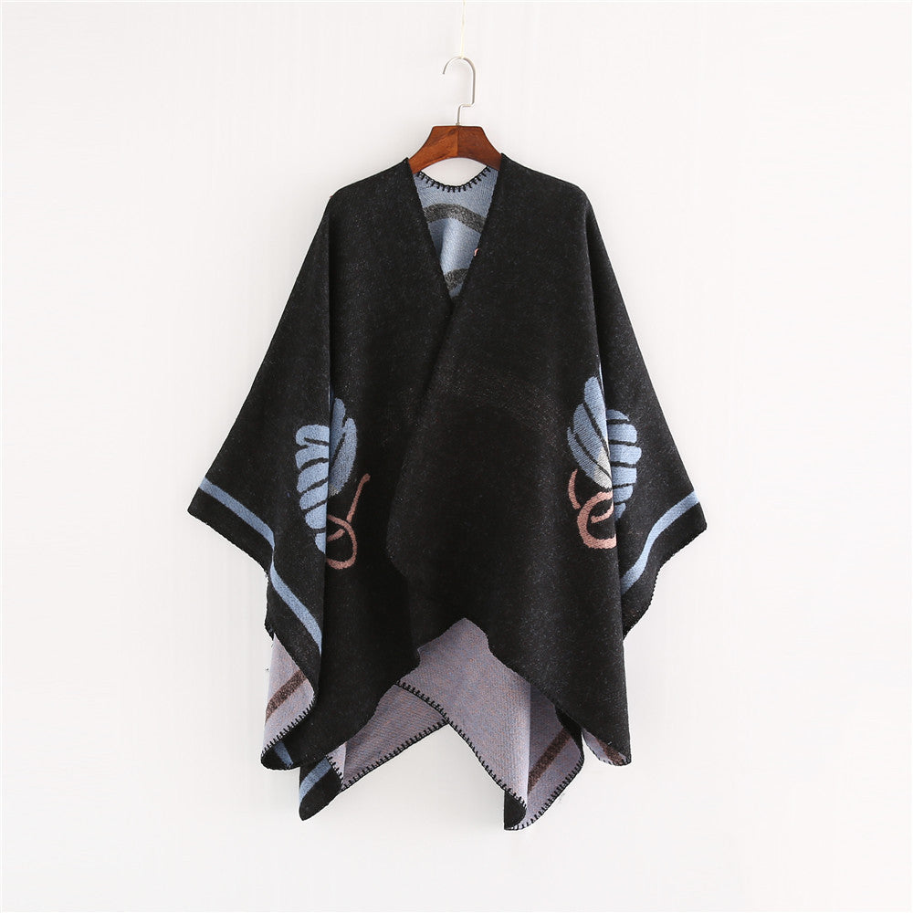 Damen Jacquard-Ruana mit floralem Intarsienmuster und zweifarbiger Wendekante Shop Nory