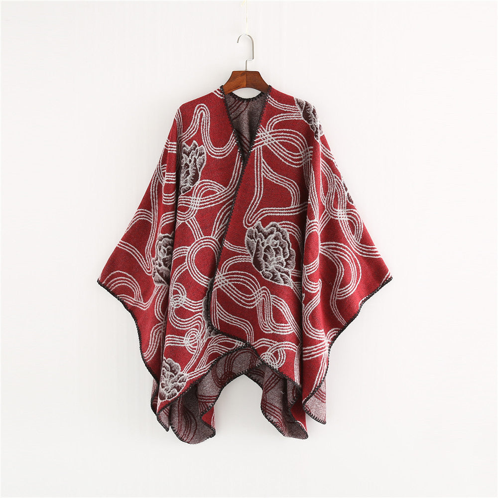 Damen Jacquard‑Ruana mit floralem Relief und kontrastierter Kettelnaht Shop Nory