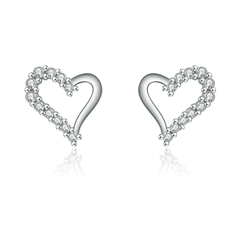 Damen Ohrringe im eleganten Herzdesign mit funkelnden Zirkonia Shop Nory