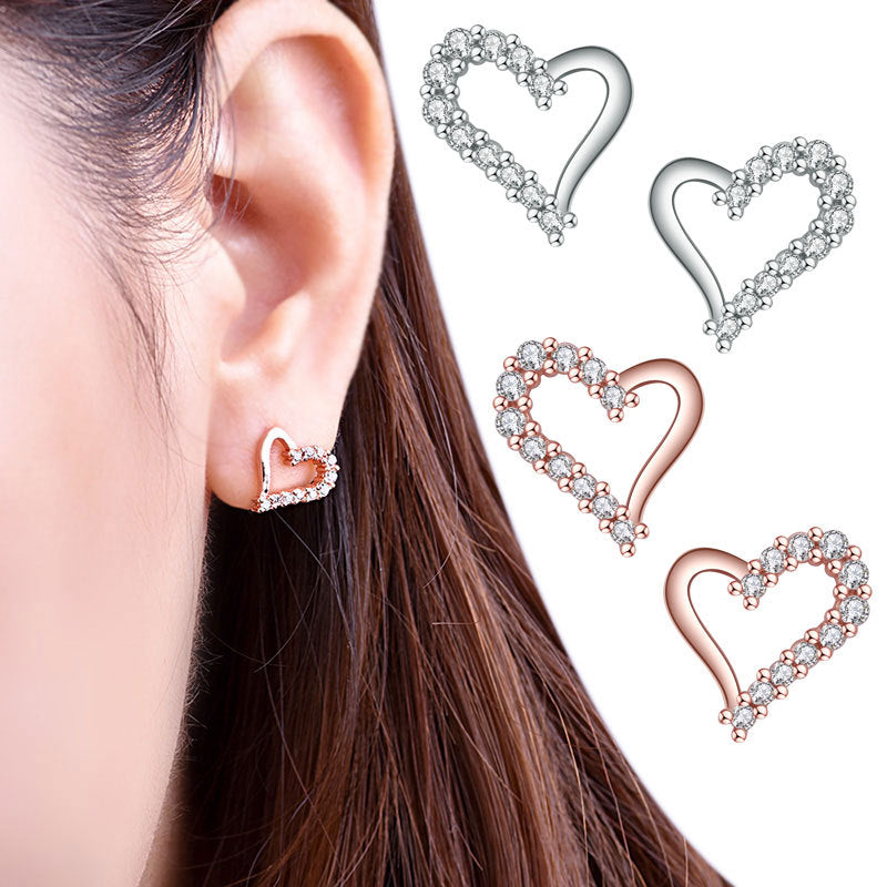Damen Ohrringe im eleganten Herzdesign mit funkelnden Zirkonia Shop Nory