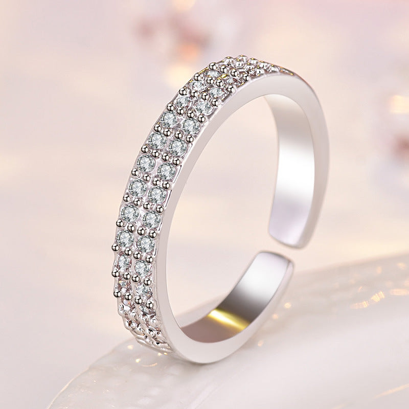 Damen Offener Ring mit funkelnden Zirkonia-Elementen und modernem Design Shop Nory