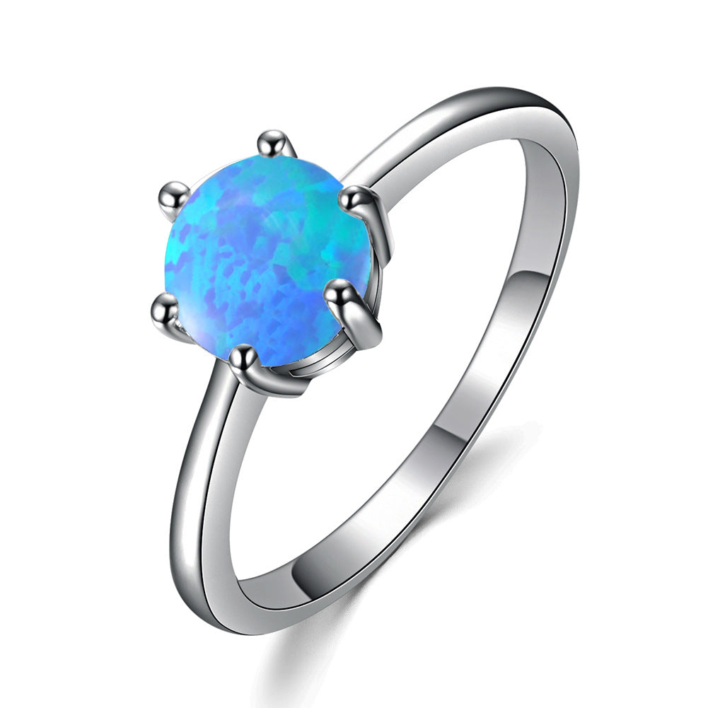 Damen Ring mit funkelndem Opal und eleganter Edelstahlfassung Shop Nory