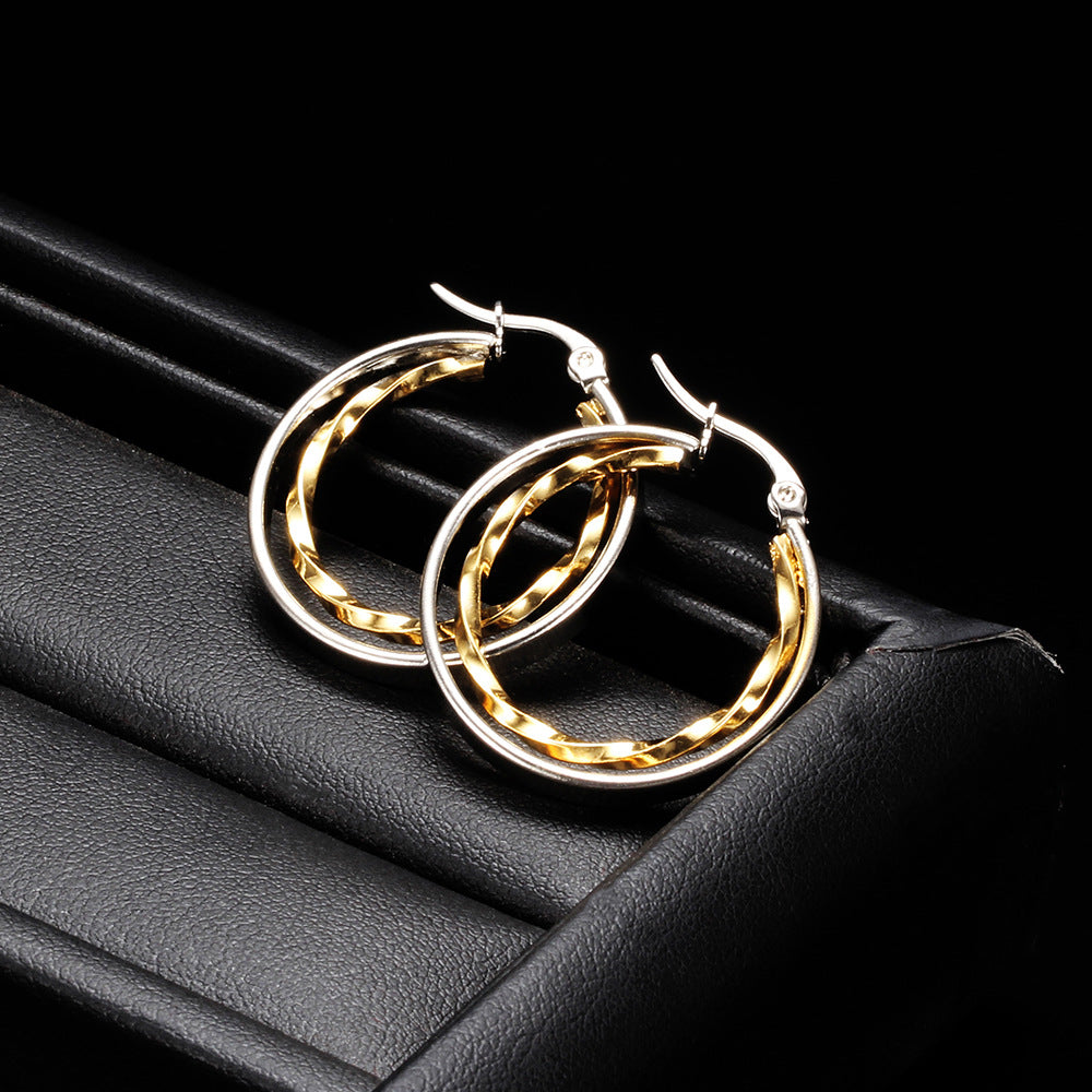Damen Creolen aus hochwertigem Edelstahl mit elegantem, gewundenem Design Shop Nory