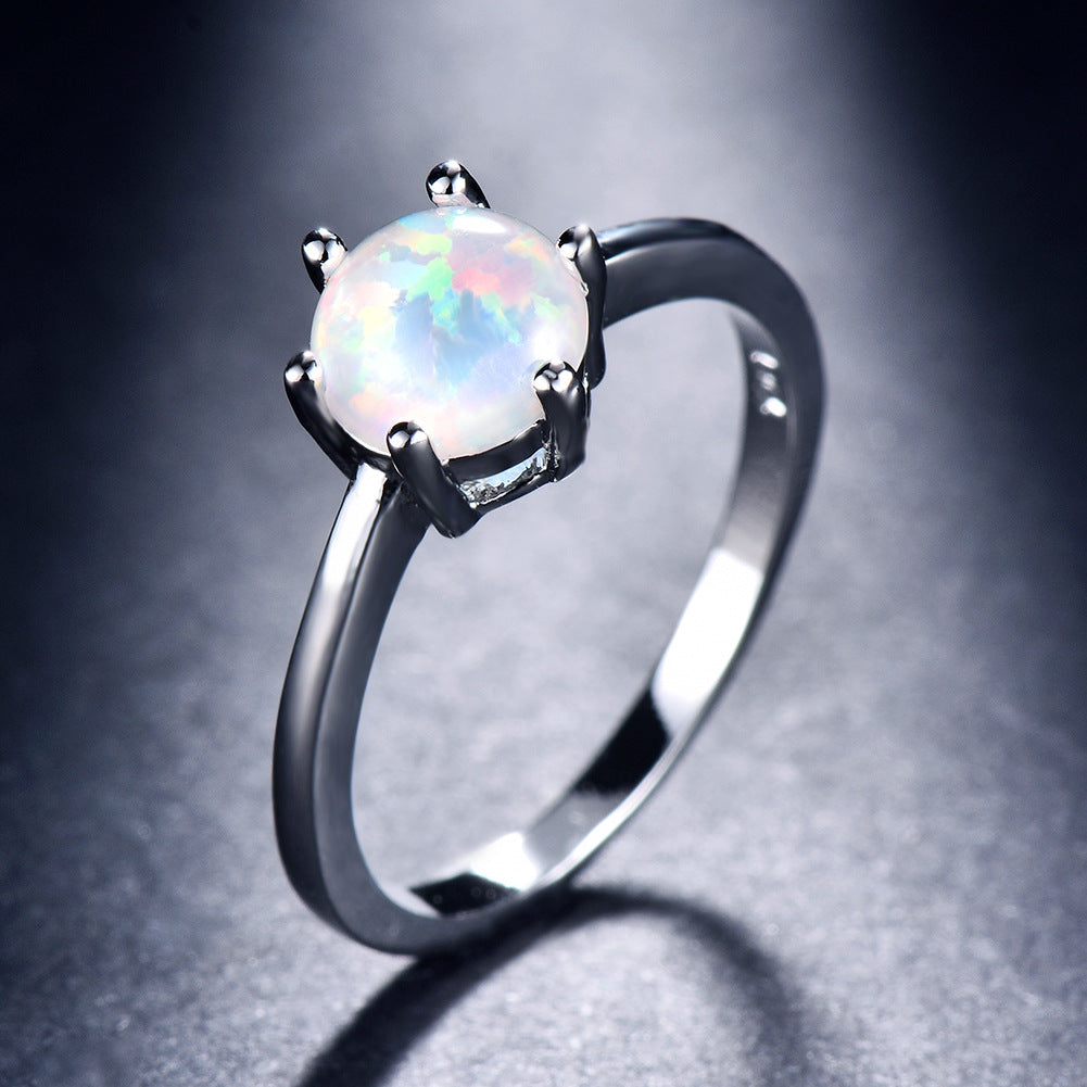Damen Ring mit funkelndem Opal und eleganter Edelstahlfassung Shop Nory