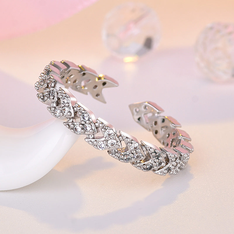 Damen Offener Ring mit kunstvollem Zopfdesign und funkelnden Zirkonia Shop Nory
