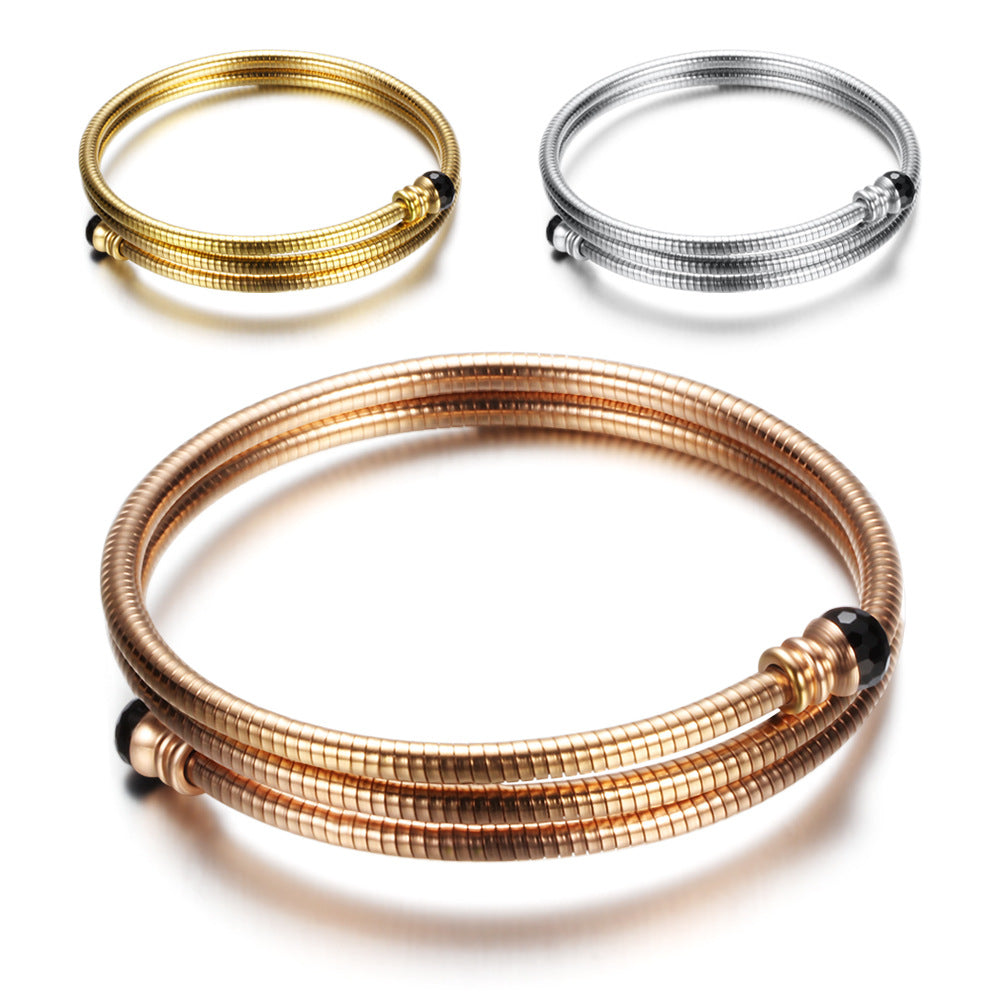 Damen Armreif mit elegantem, geschwungenem Design und funkelnden Akzenten Shop Nory