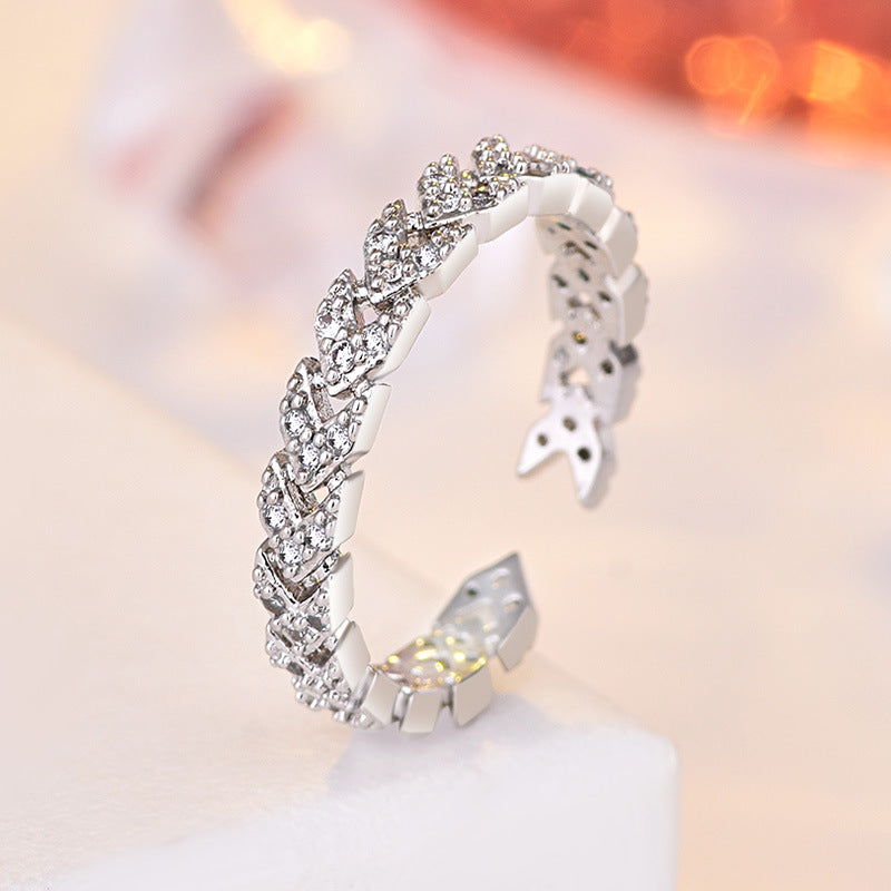 Damen Offener Ring mit kunstvollem Zopfdesign und funkelnden Zirkonia Shop Nory