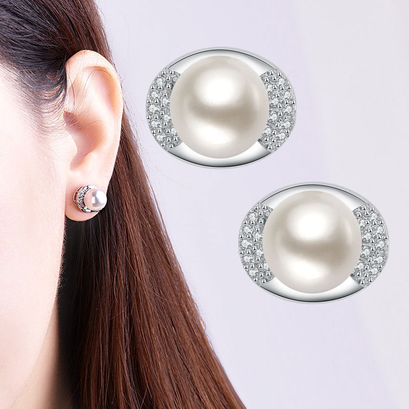 Damenohrringe mit hochwertiger Perle und funkelnden Zirkonia-Elementen Shop Nory
