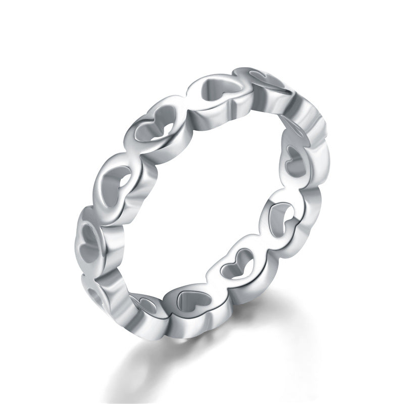 Damen Ring mit herzförmigem Design und funkelnder Oberflächenstruktur Shop Nory