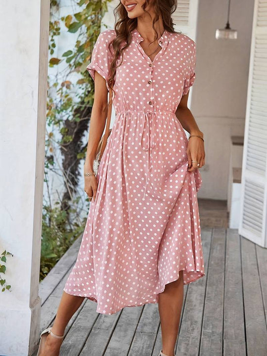 A-linien-kleid mit polka-dot-print und v-ausschnitt