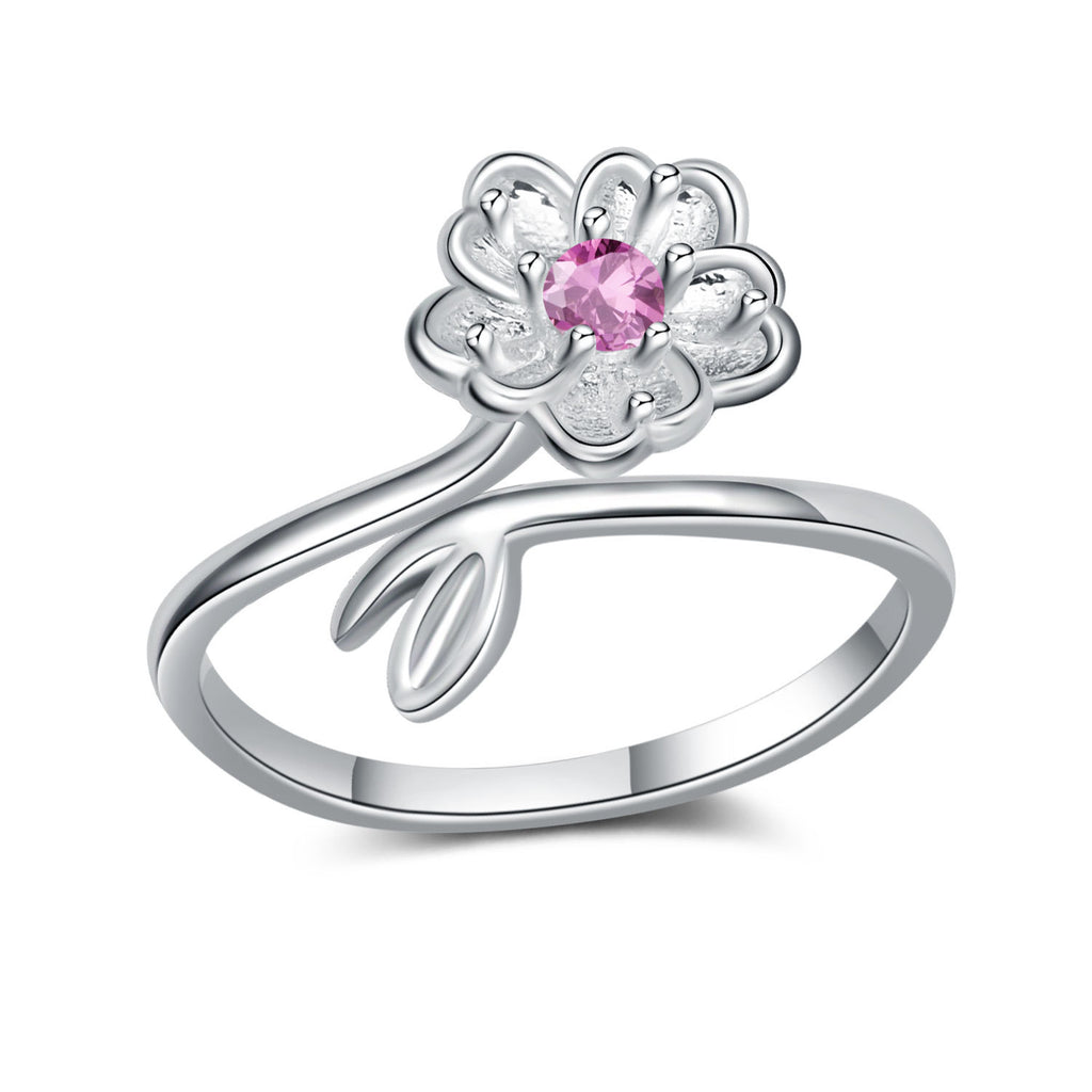 Damenring mit kunstvollem Blumenmotiv und strahlendem Zirkonia Shop Nory