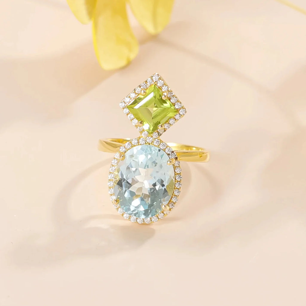 Ring mit blauem Topas und Peridot mit zwei großen Edelsteinen einzigartiger Verlobungsring | Shop Nory