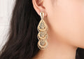 Damen Gold Hollow Cut Out Tier Layered Geer Wheel Drop Ohrringe | Shop Nory