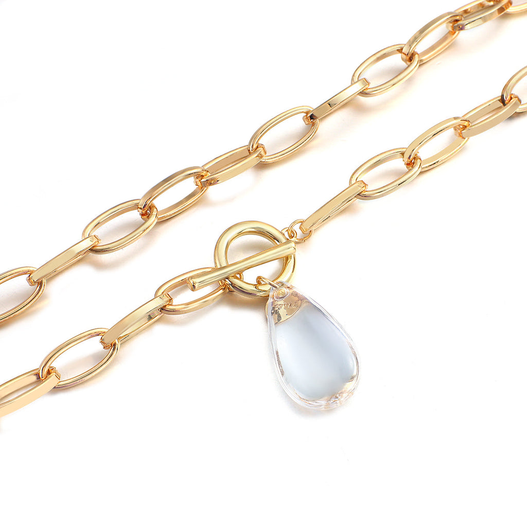 Goldbeschichtete Chunky-Link-Kette & durchsichtiger Kristall-Wassertropfen-Anhänger | Shop Nory