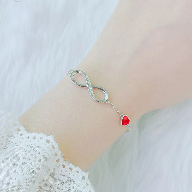 Damen Silber Rote Herzförmige Kristall Unendlichkeit-Link Kettenarmband | Shop Nory