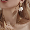 Acryl bemalte Blüten Clip-on Ohrringe | Shop Nory