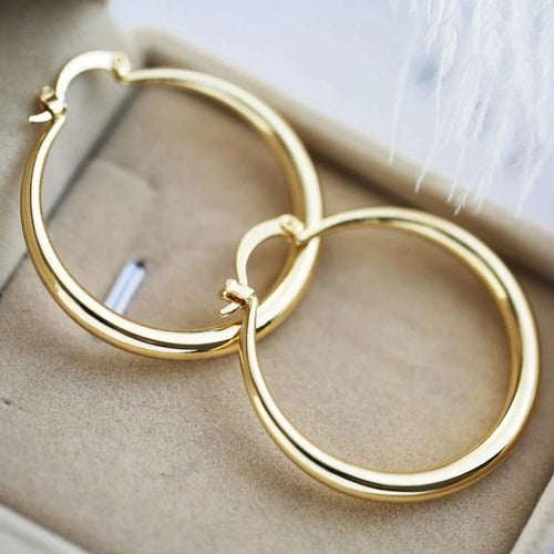 Große Creolen in Gold | Shop Nory