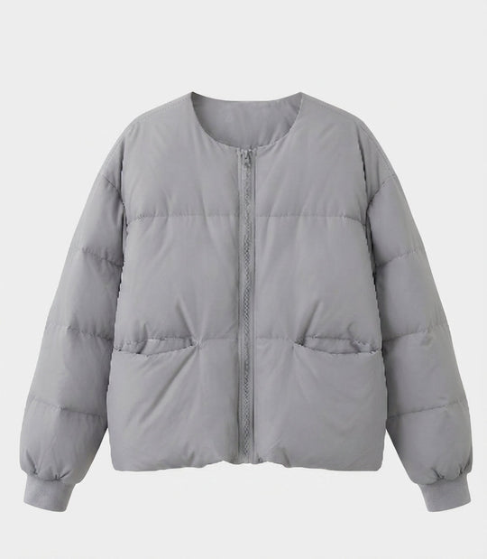 Damen kurze boxy gesteppte Jacke mit geradem Schnitt, verdecktem Reißverschluss und elastischen Bündchen