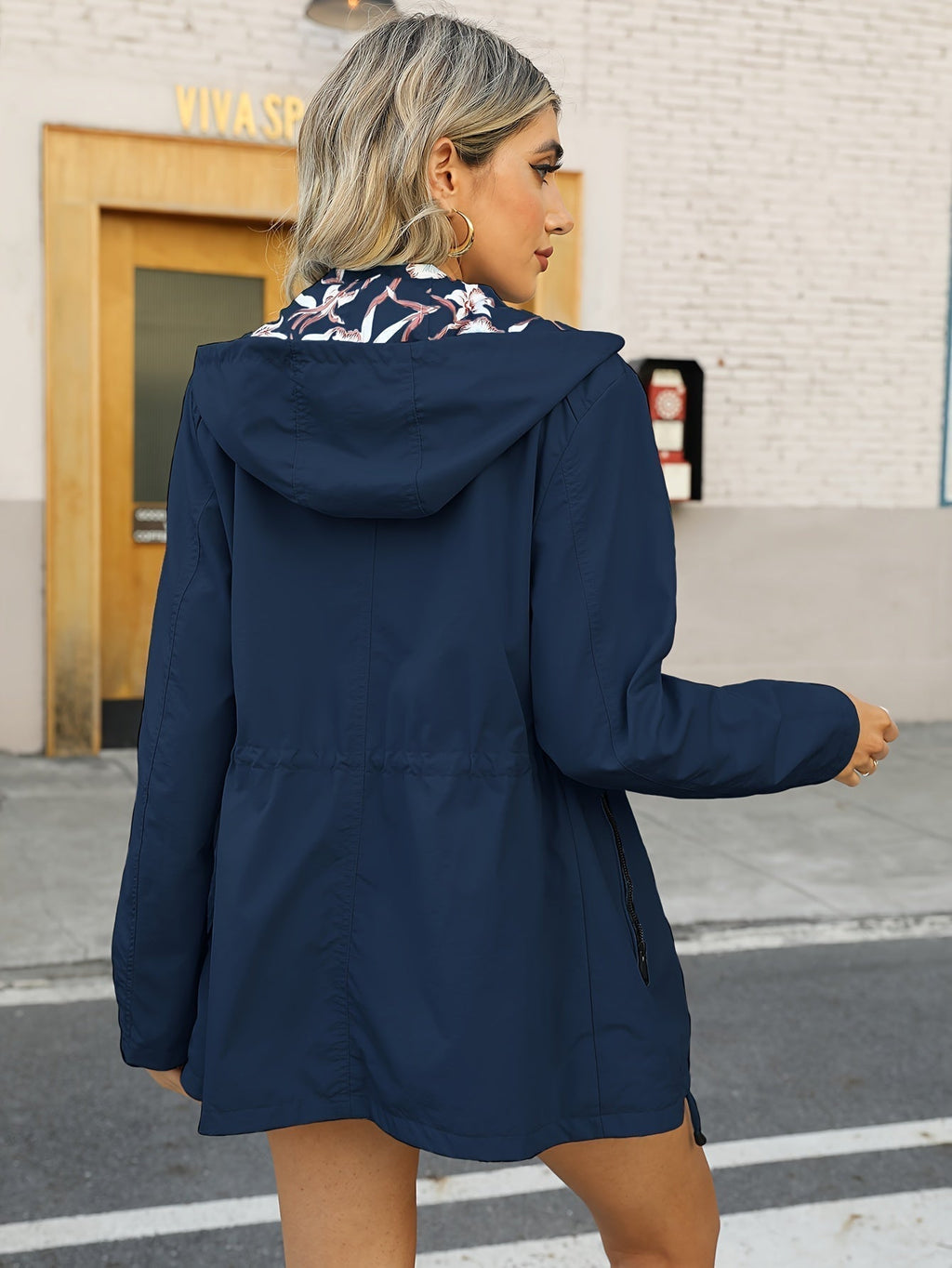 Shopnory | Damen Regenjacke mit Kapuze und Blumenmuster Futter