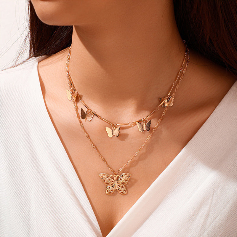 Goldene Schmetterlings-Anhänger Mehrschichtige Choker CutOut Schmetterlings-Pendelkette | Shop Nory