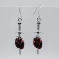 Silver and Red Anatomical Heart with Sword Charm Earrings | Shop Nory