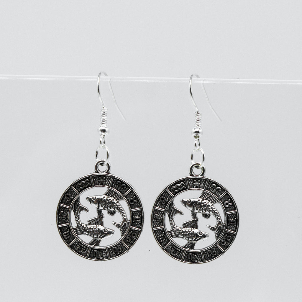 Silberohrringe mit Zodiac-Symbol-Münzanhänger | Shop Nory