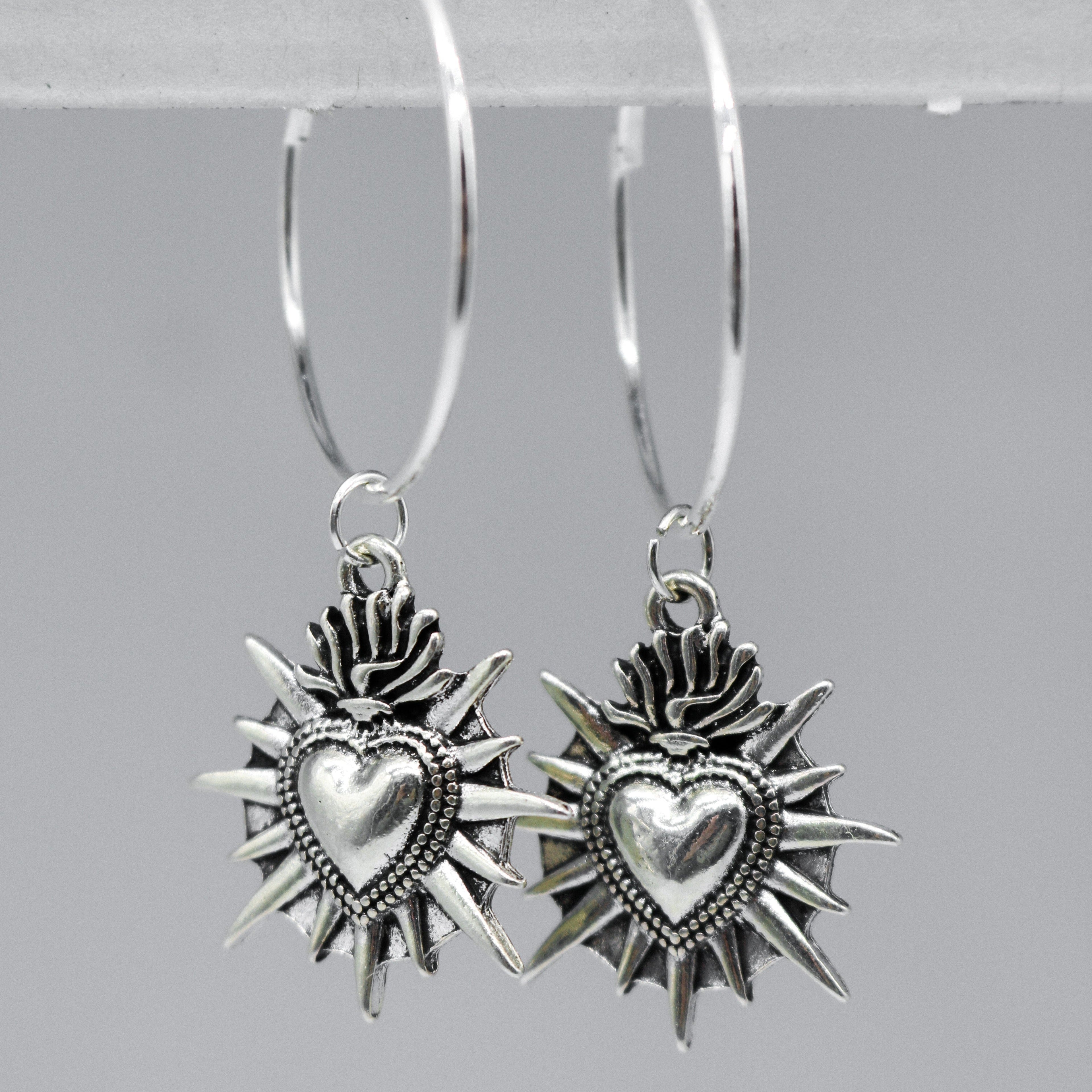 Silver Sacred Flaming Heart Charm Hoop Earrings | Shop Nory