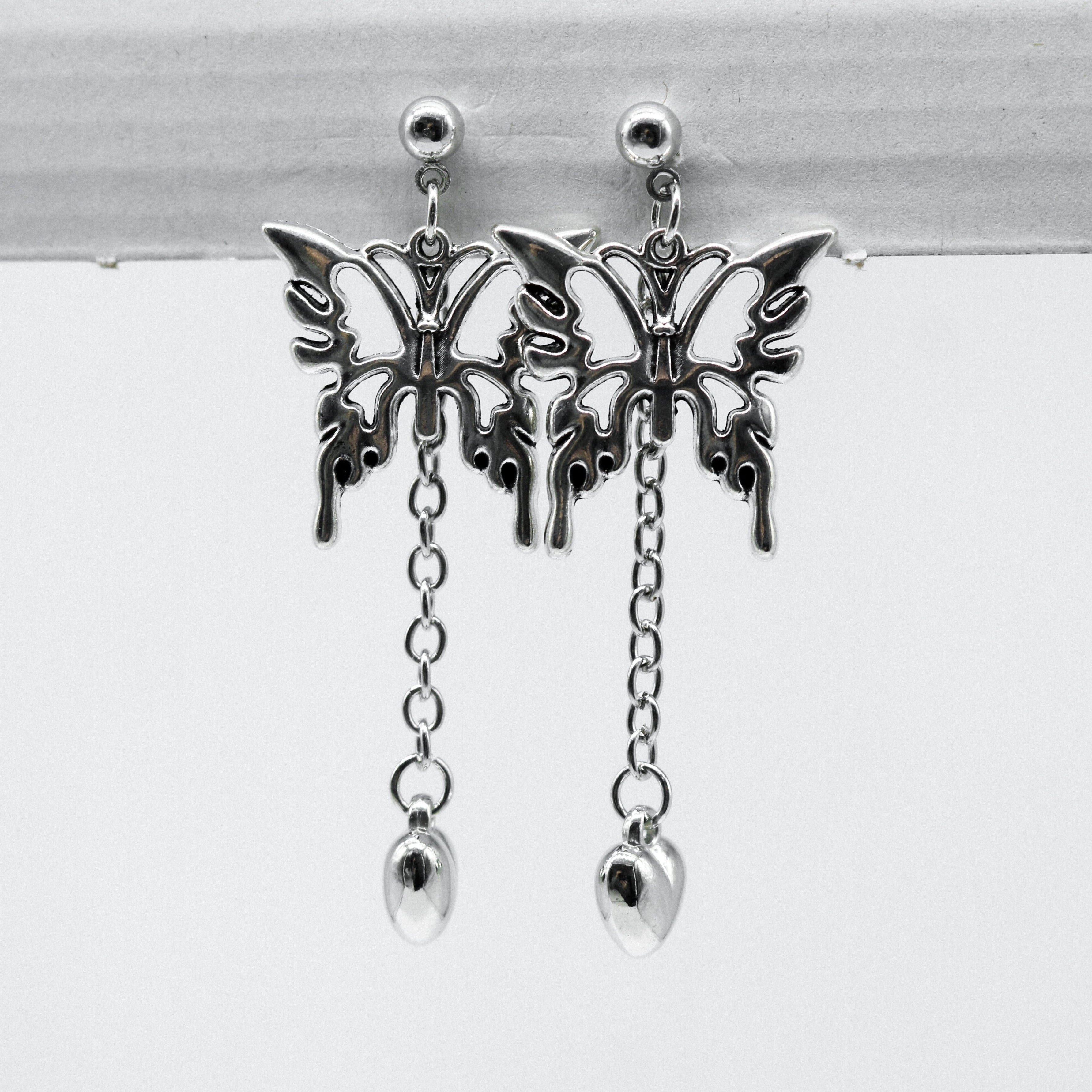 Silberne Schmetterlingsherz Kettenanhänger Ohrringe | Shop Nory