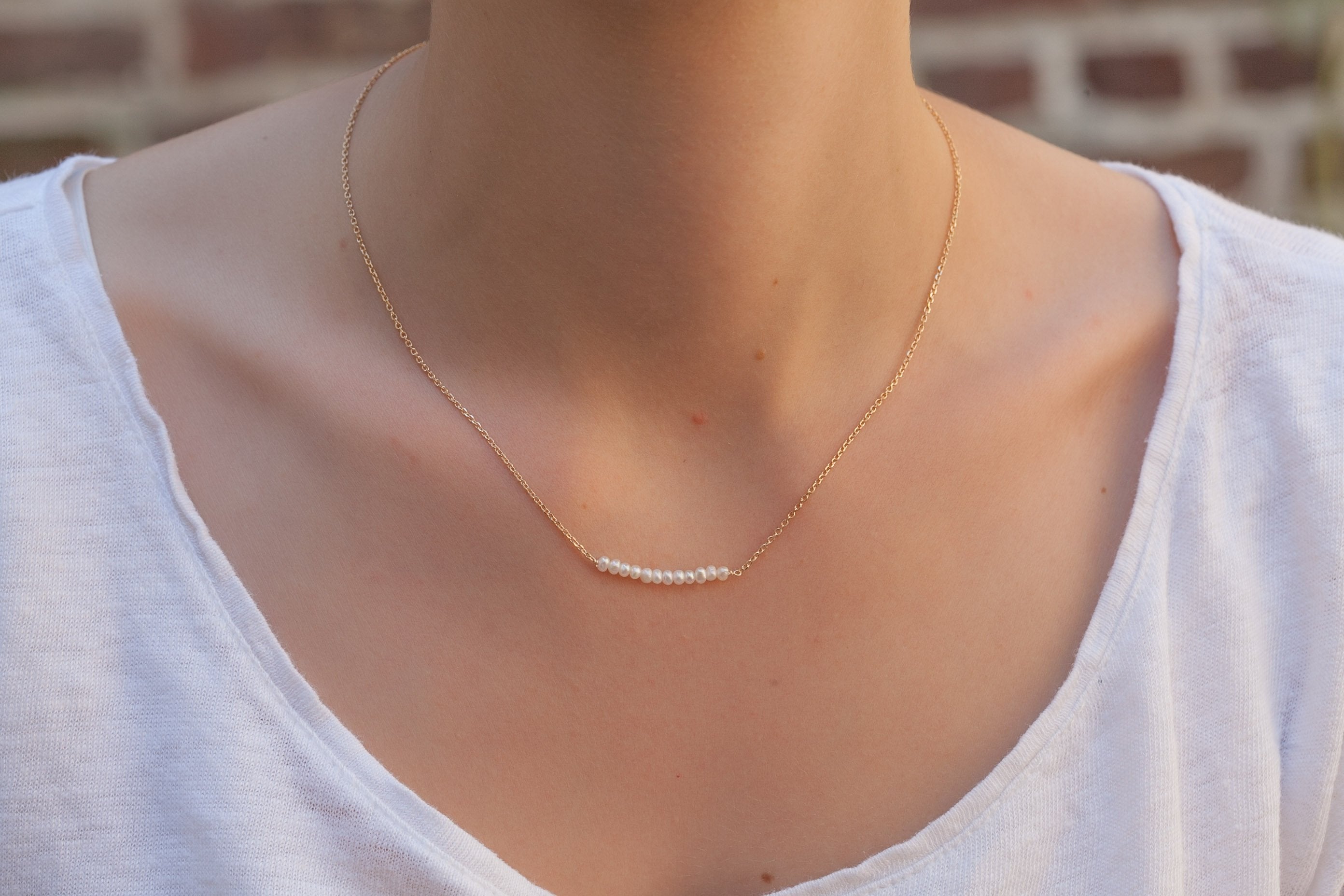 Kette mit 12 weißen Perlen - 16K vergoldet | Shop Nory