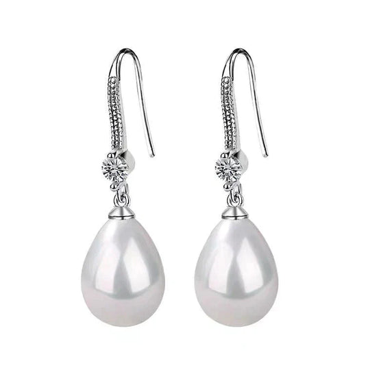 Weiße ovale Perlenohrringe | Shop Nory