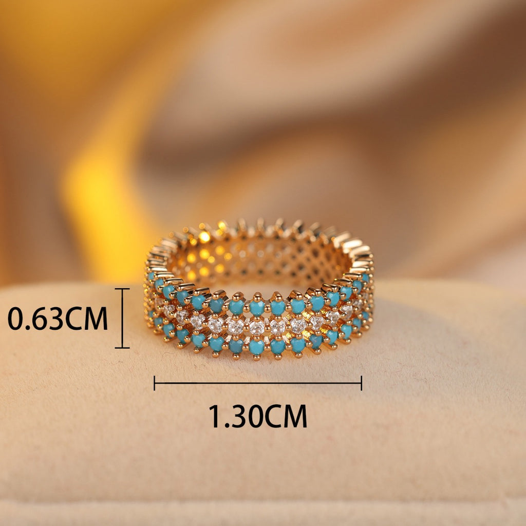 Damen Ring mit funkelnden aquamarinen und glitzernden Zirkonia-Details Shop Nory