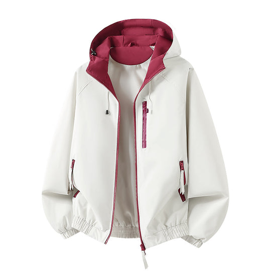 Damen Leichte Kapuzen‑Shelljacke im Urban‑Look mit kontrastfarbenem Futter, Reißverschlusstaschen und elastischem Bund Shop Nory