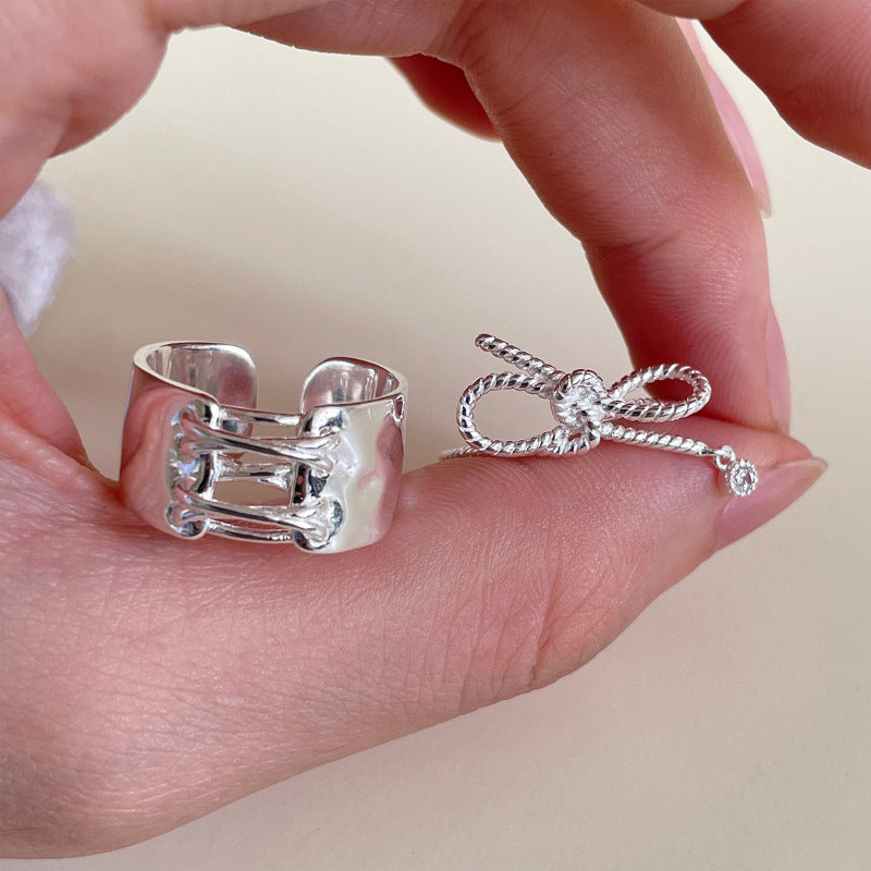 Damen Ohrstecker mit kunstvollem Schleifen-Design und funkelndem Zirkonia Shop Nory