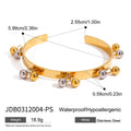 Damen Armreif mit eleganten Kugelanhängern aus hypoallergenem Edelstahl Shop Nory