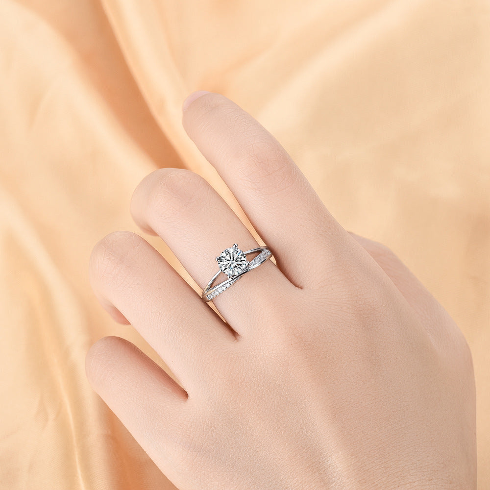 Damen eleganter Solitärring mit geschwungenem Design und funkelndem Zirkonia Shop Nory