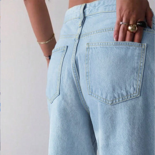 Damen Weite Denim-Culotte mit hohem Bund, Distressed-Details und rohem Saum Shop Nory
