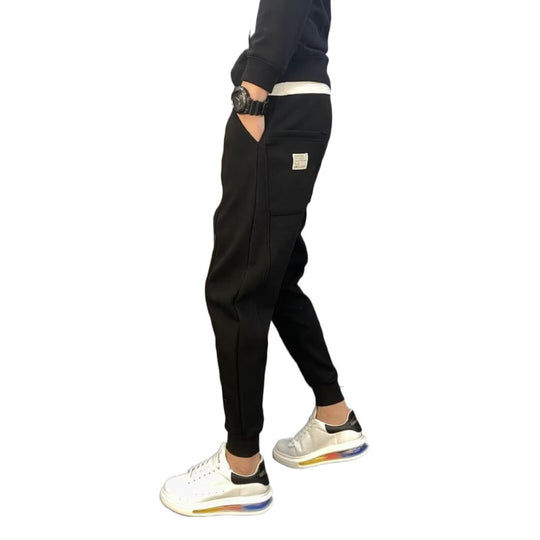 Herren Jogginghose mit tailliertem Tapered‑Schnitt, Bügelfalte und elastischen Bündchen Shop Nory