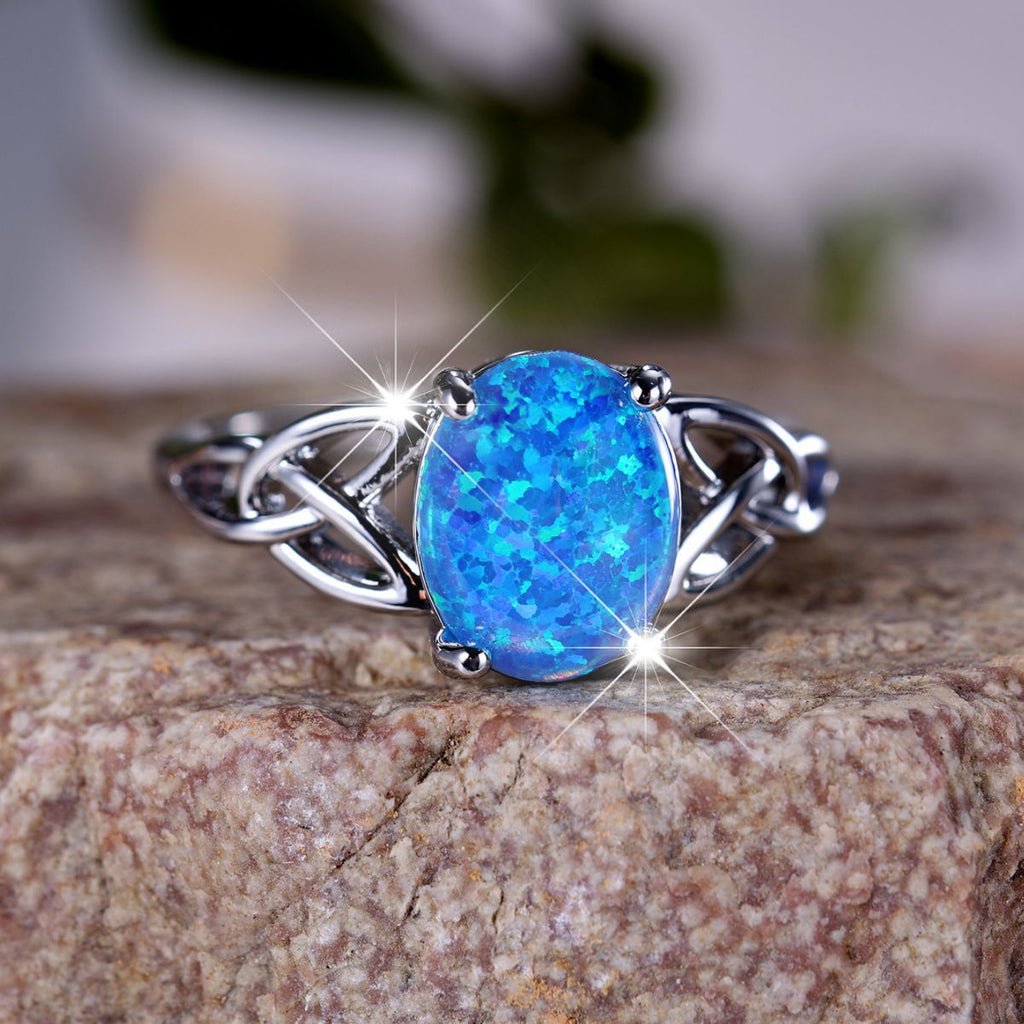 Damen Ring mit schimmerndem Opal und eleganter Zirkonia-Fassung Shop Nory