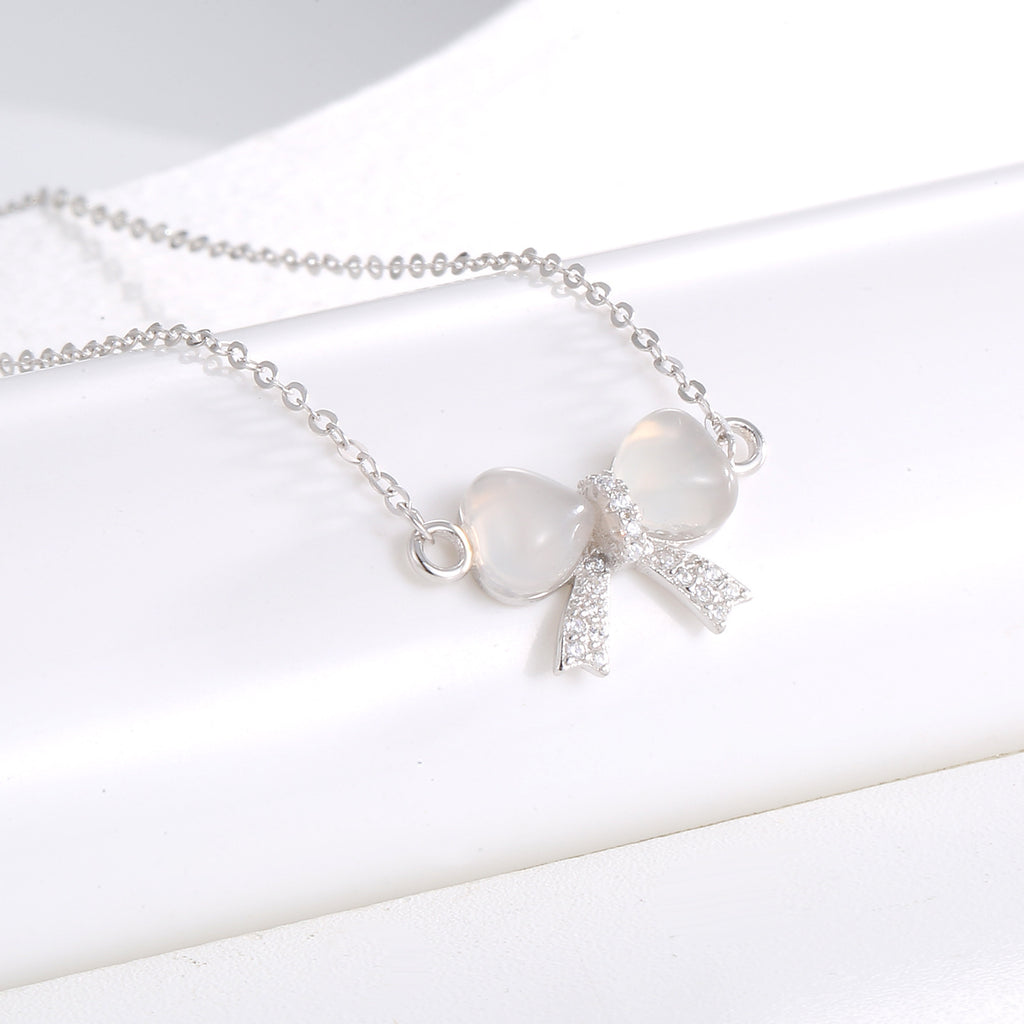 Damen Halskette mit kunstvollem Schleifenanhänger und strahlenden Zirkonia Shop Nory