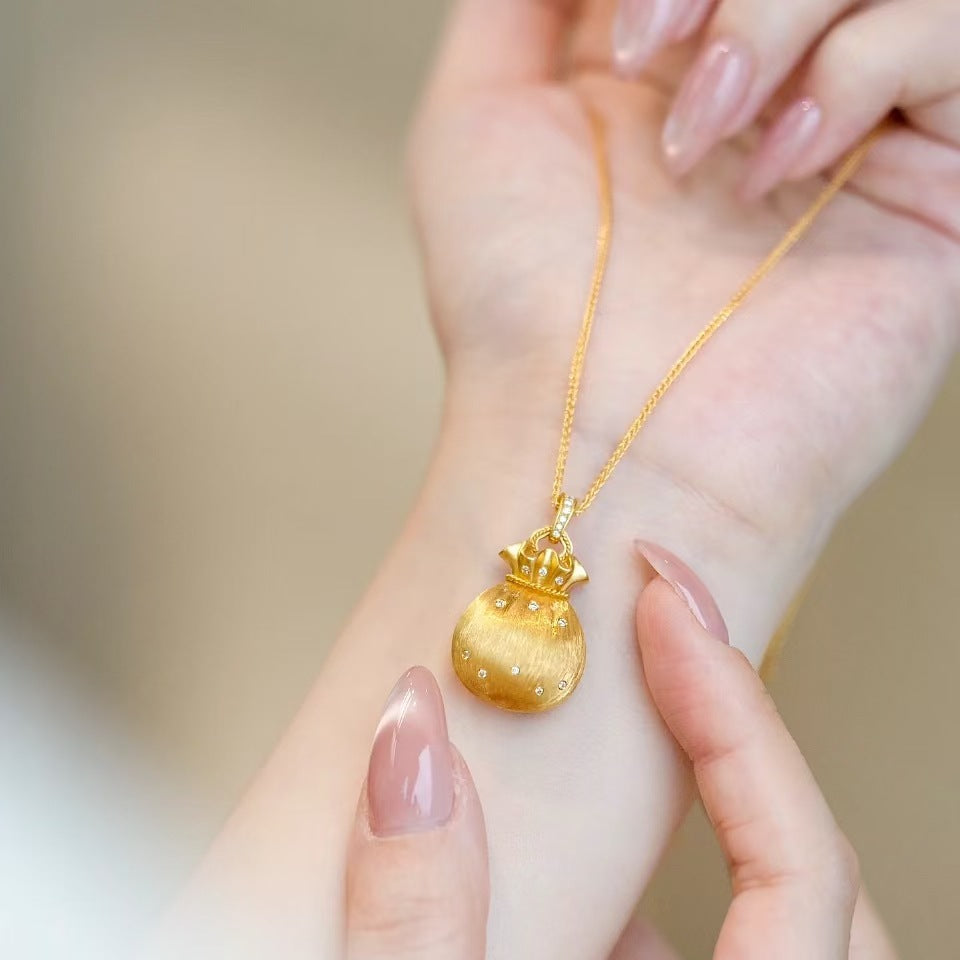 Damen Anhänger im eleganten Geldbeutel-Design mit funkelnden Kristallen Shop Nory