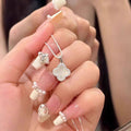 Damen Halskette mit filigranem Blumenanhänger und elegantem Zirkonia-Besatz Shop Nory