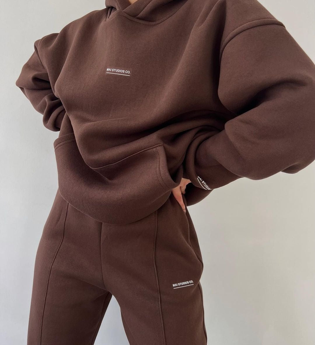 Damen Set Schwere French‑Terry Oversize‑Kapuzenpullover mit Kängurutasche und Slim‑Jogginghose Shop Nory