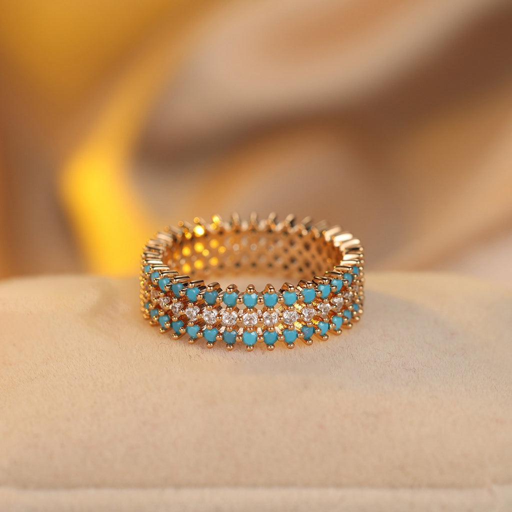Damen Ring mit funkelnden aquamarinen und glitzernden Zirkonia-Details Shop Nory