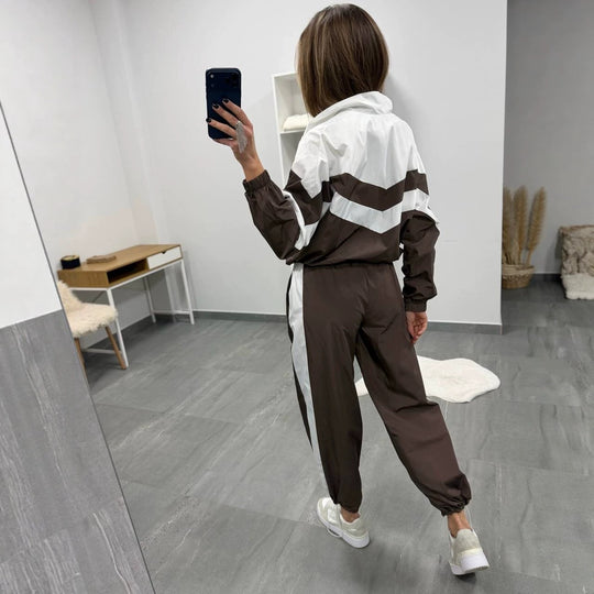 Damen retro Nylon-Trainingsanzug mit Kapuzen-Zipjacke und weiter hochgeschnittener Hose Shop Nory