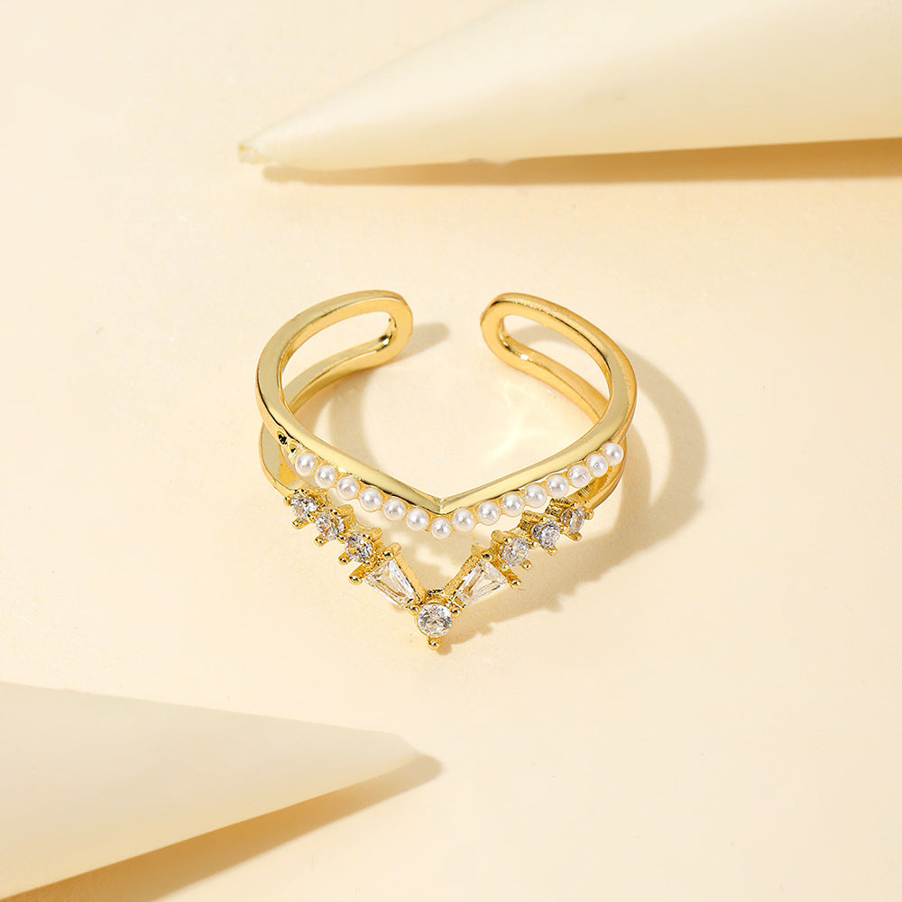 Damen eleganter und funkelnder Ring mit Perlen und Zirkonia Shop Nory