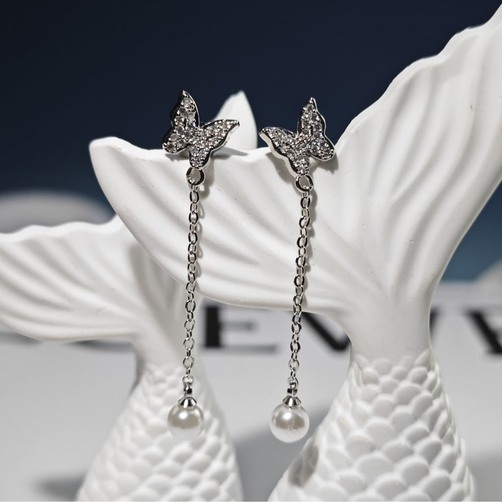 Damen Ohrringe mit Schmetterlingsdesign und Perlenanhängern Shop Nory