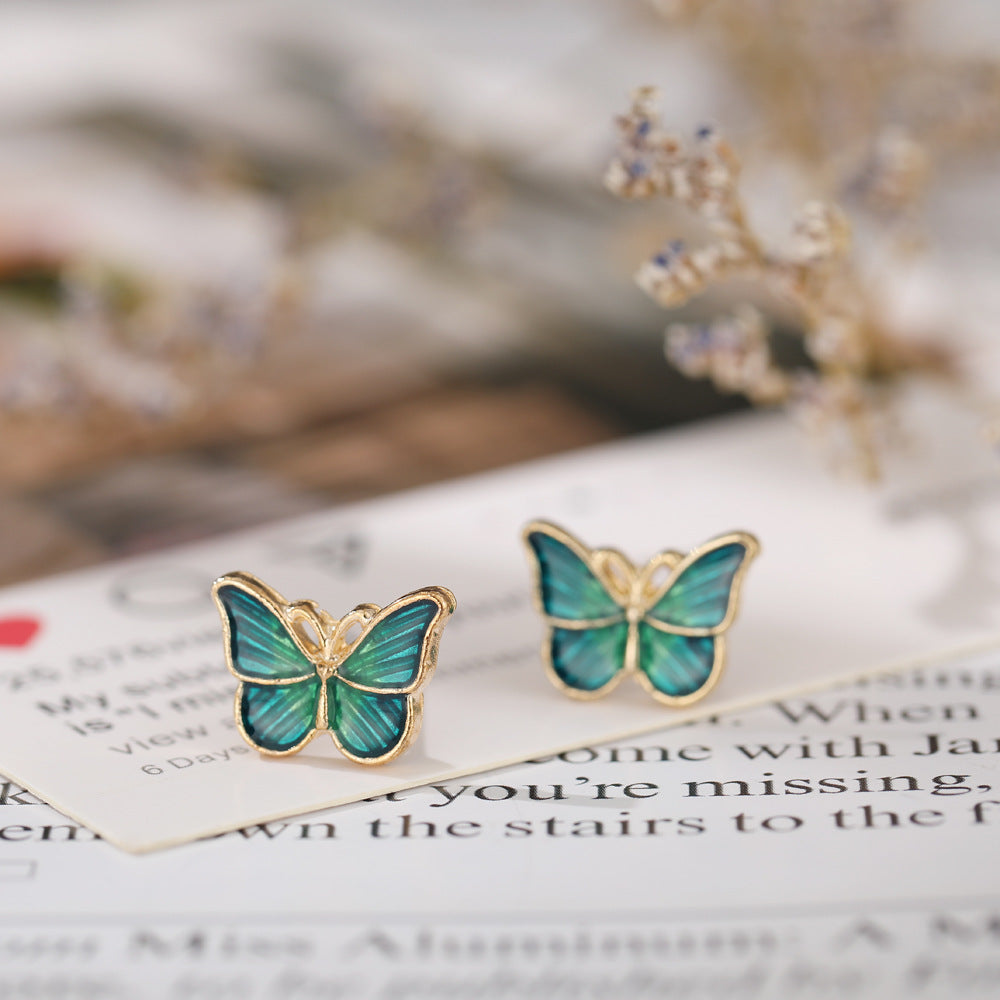 Damen Ohrringe mit floralem Schmetterlingsdesign Shop Nory