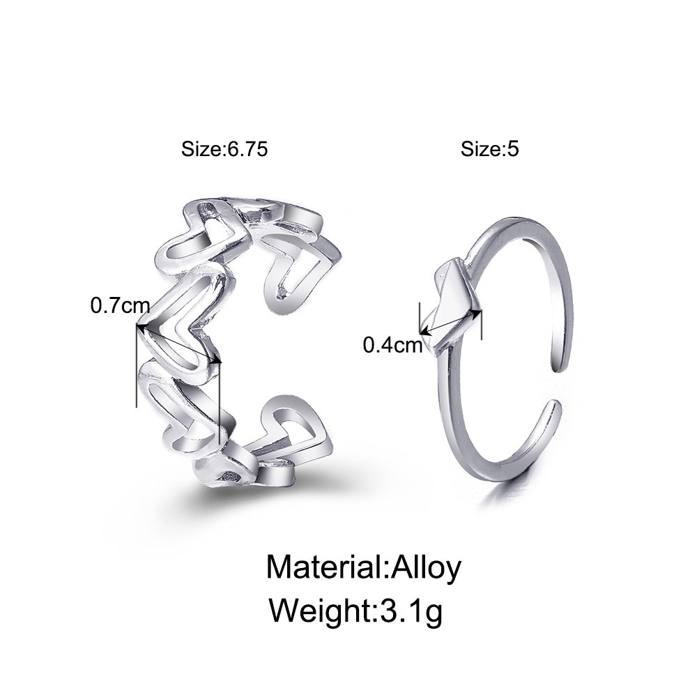 Damenring mit verspieltem Herzdesign und feinem Metallrahmen Shop Nory