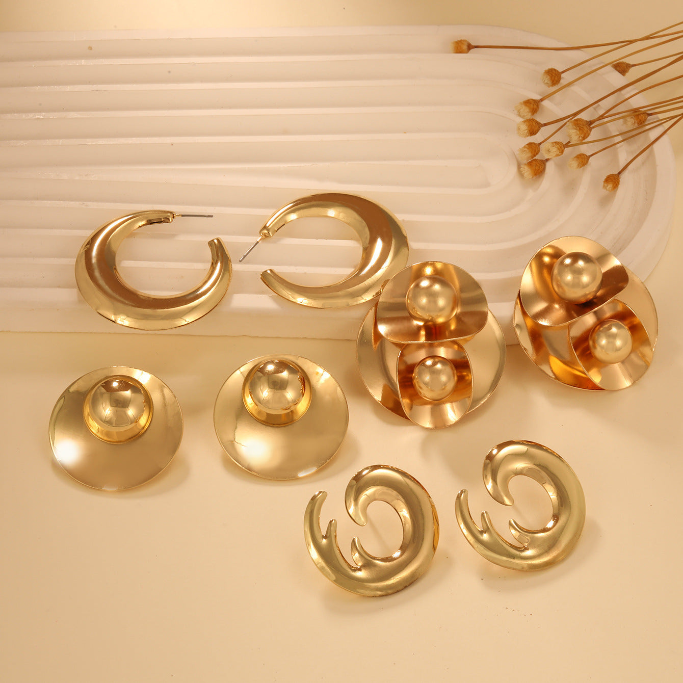 Damen Ohrringe im eleganten Wellenmuster Shop Nory
