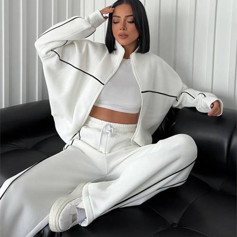Damen lässiges Sweatset mit Stehkragen Reißverschluss gekürzter Jacke und hochtaillierter Schlaghose Shop Nory